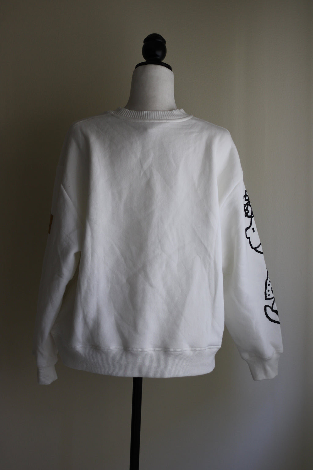 Moletom branco Peanuts Stradivarius, vista lateral